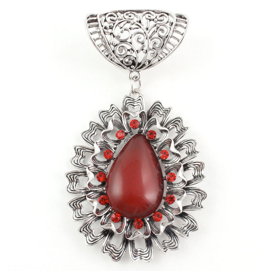 #S582 Silver Abstract Oval w/ Red Stones